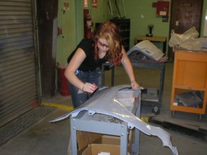 Shown above Katarina Harvey is wet sanding her panel to prepare for top coat application.