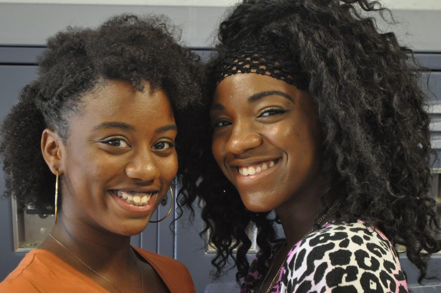 Black women are wearing their natural hair proudly. 