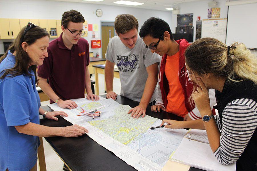 Students learn about technology and aerodynamics involved in pilot aircraft.