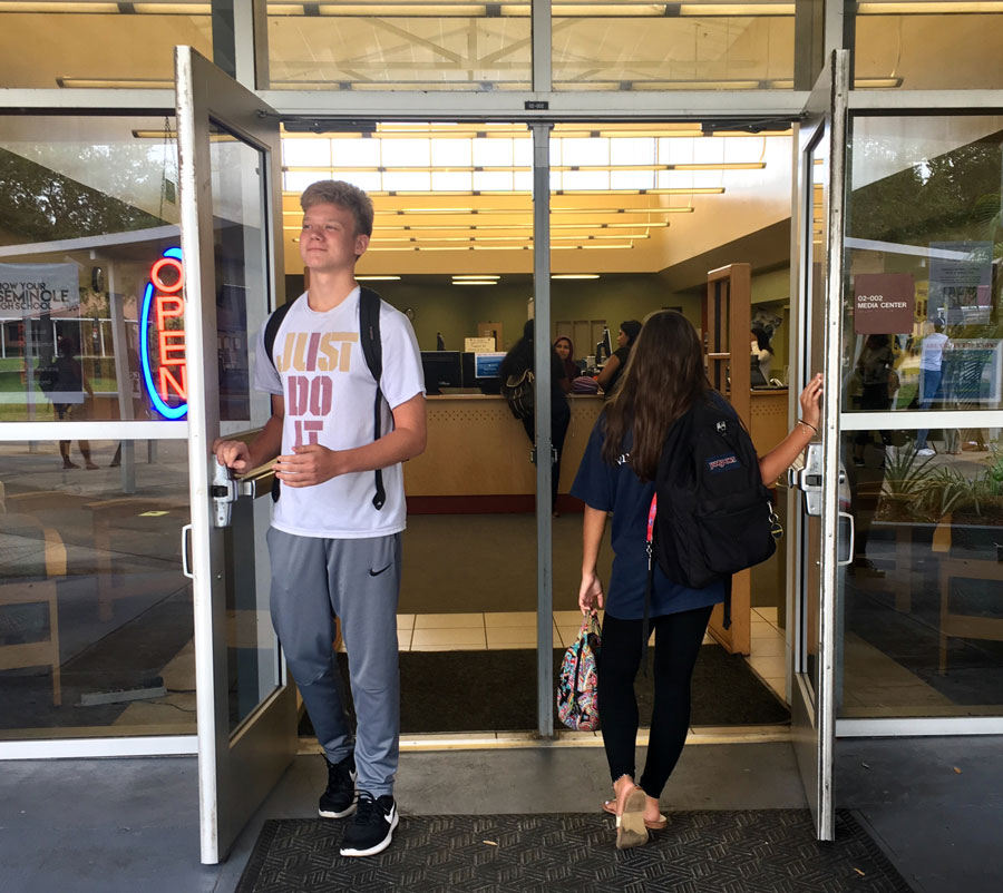 Freshman take their first steps into high school as seniors walk out.
