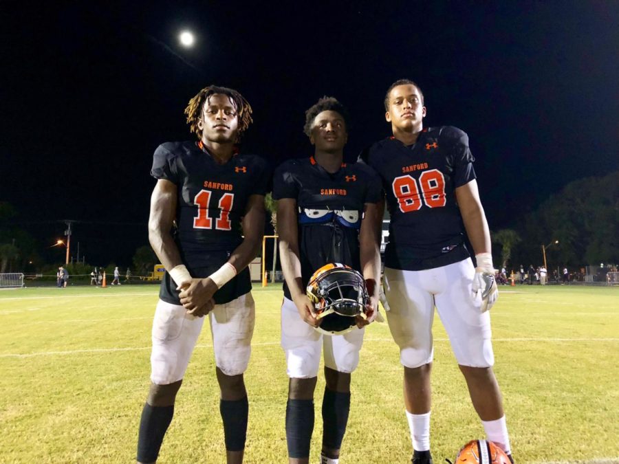 Zion Jackson (left), OShae Baker (middle), and Jordan Davis (right) have used their football careers at SHS as a launchpad to college.