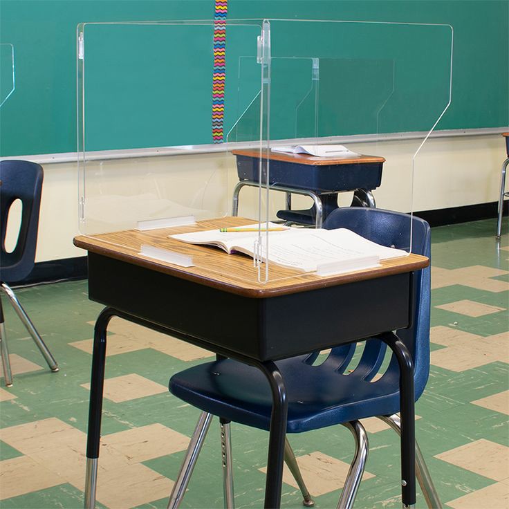 Seminole High School has been taking many precautions to ensure that students on campus are safe. One is students must be seated 6-feet apart during class time  with plexiglass screens surrounding the desks and tables must be sanitized after every class. Photo credit: New York TImes