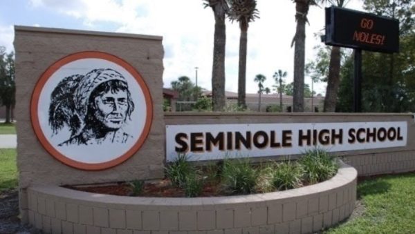 Photo taken in the front of the school shows the Native American inspired origin and theme.