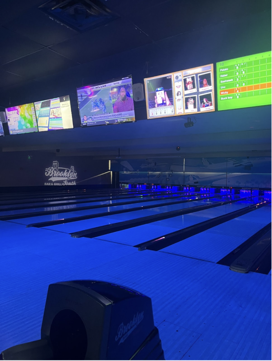 The bowling alley fills with Beta Chi kids making strikes and memories under the cool blue light.
