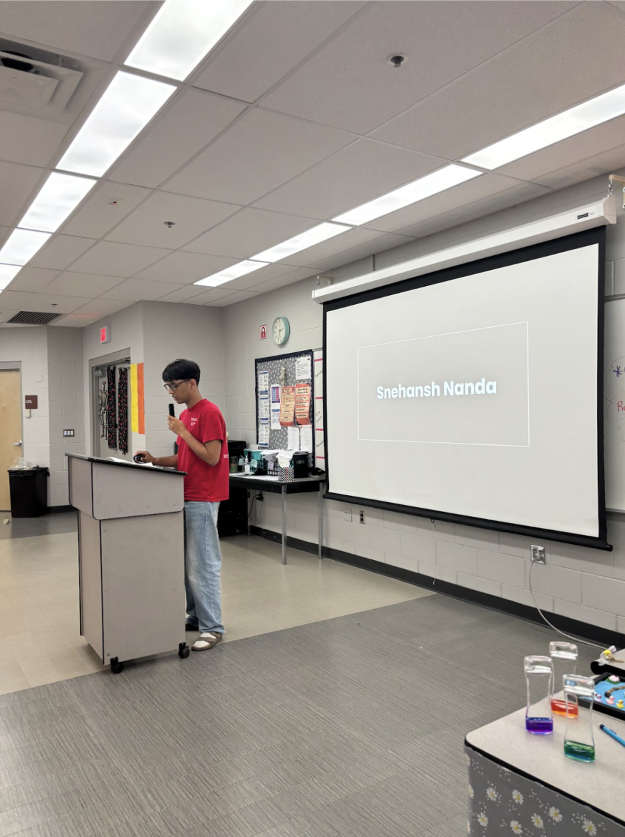 Photo of one of the HOSA officers speaking at the HOSA Officer Speeches meeting

