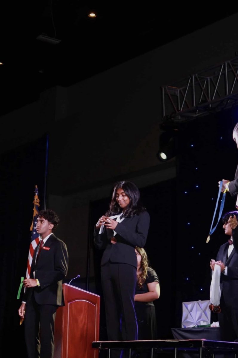 Pavithra Yerra placing 3rd at SLC - photo by Maggie Sun 

